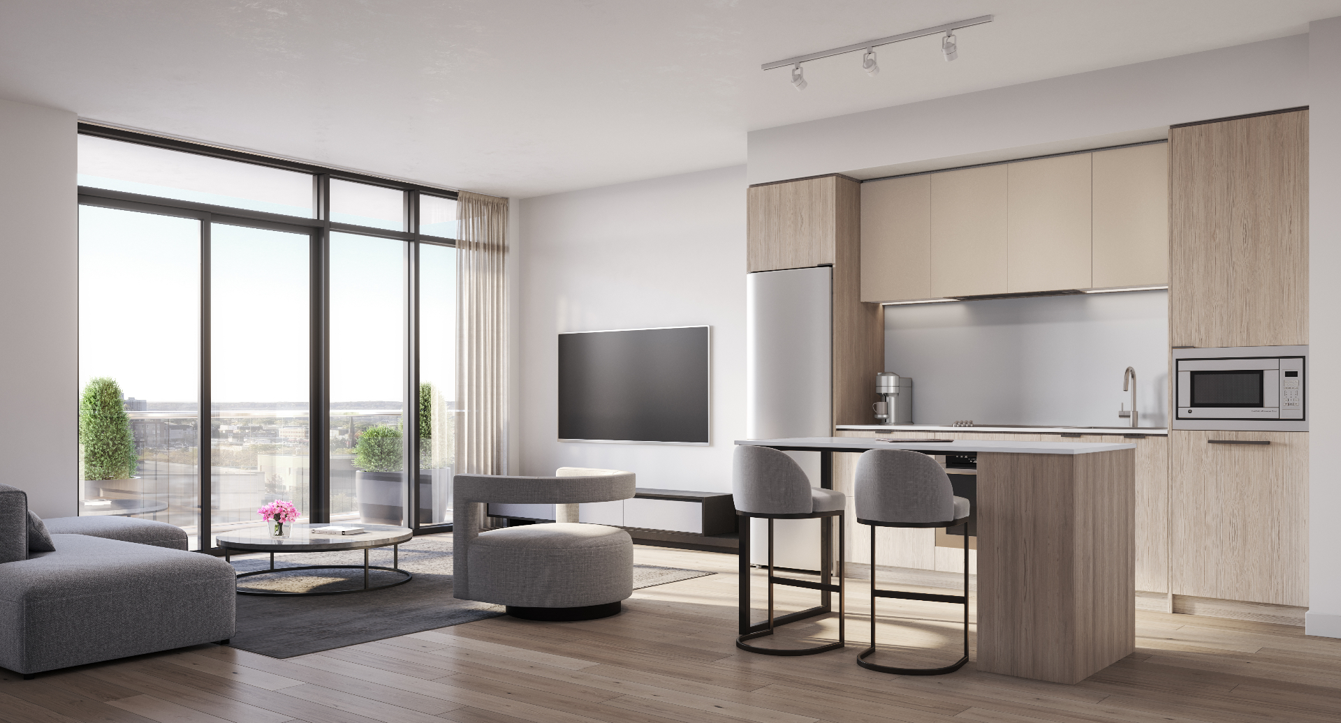 Open-concept suite interior with wood plank vinyl flooring and floor-to-ceiling windows