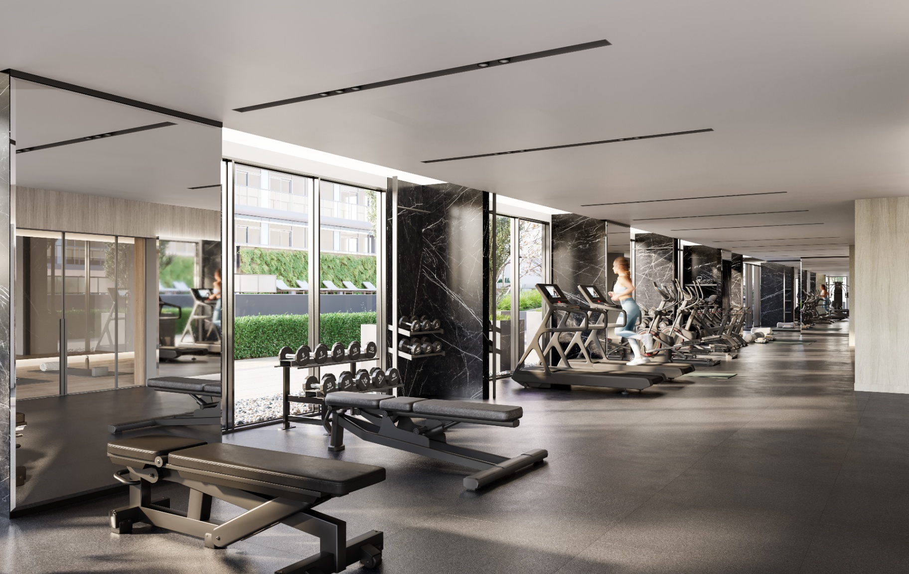 Fitness centre with Nero-marble pillars and cardio equipment